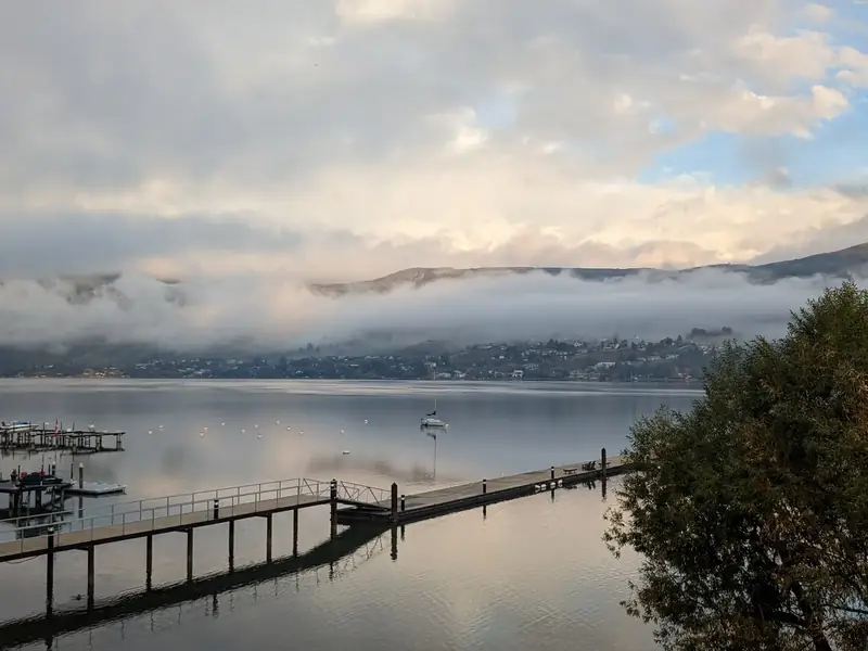Morning mist over the docks at The Strand on Okanagan Lake in Vernon